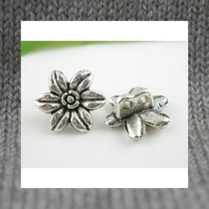 Flower metal shank buttons in a zinc based alloy, silver, 2 holes, 14mm 4/8"