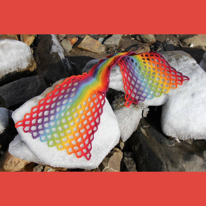 Digital knitting pattern for the Fishtail Scarf by Lucy Neatby, a scarf with an interesting method to create holes.